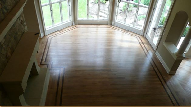 Refinished hardwood floor by Floors by Jimmy Connors